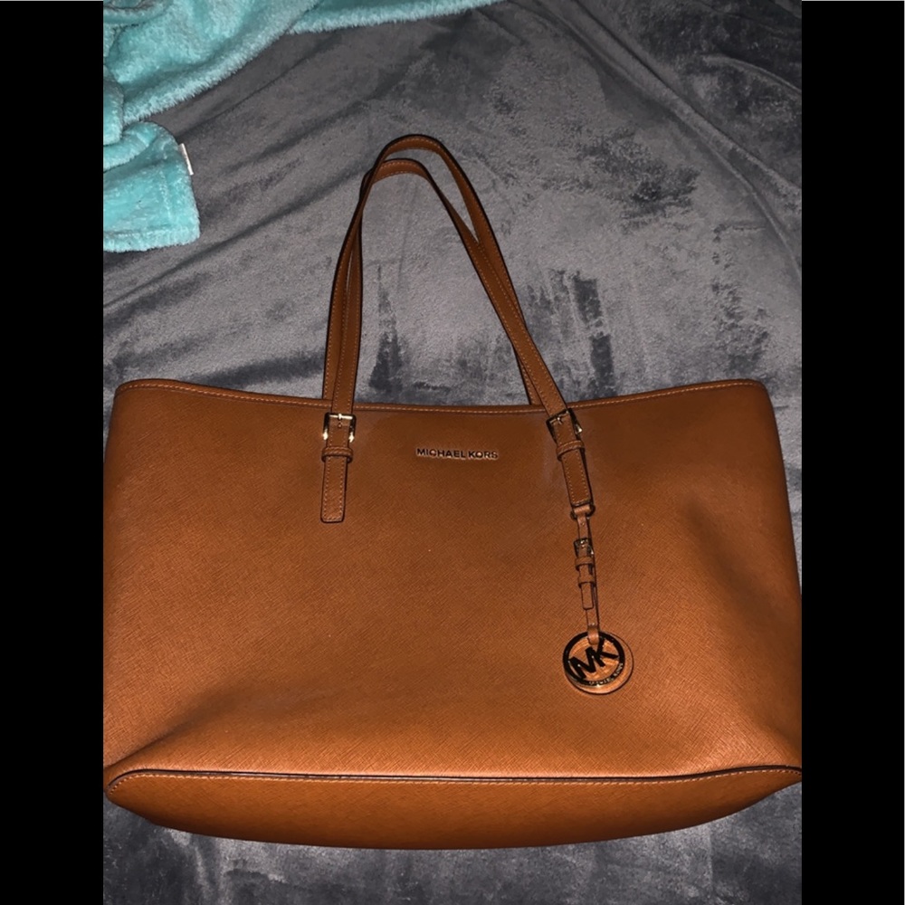 SOLD..Michael Kors Jet Set Multifunction Tote